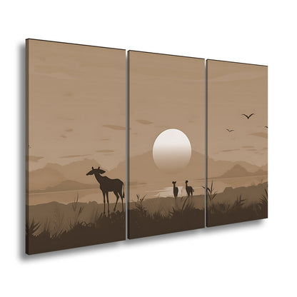 Leinwandbild Sonnenuntergang küsst die Savanne in goldene Ruhe. - deyoli