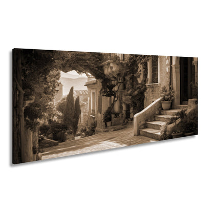Leinwandbild Sonnenverwobene Gasse voller mediterraner Ruhe - deyoli