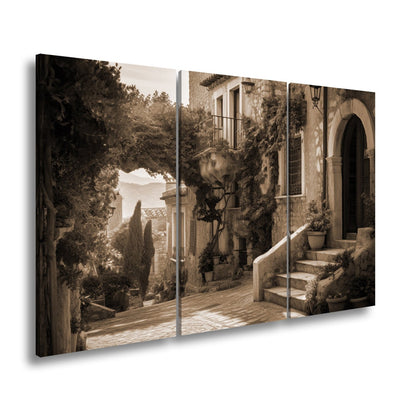 Leinwandbild Sonnenverwobene Gasse voller mediterraner Ruhe - deyoli