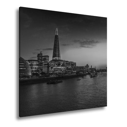 Leinwandbild Stadtlichter am Fluss – London erwacht in der Dämmerung. - deyoli