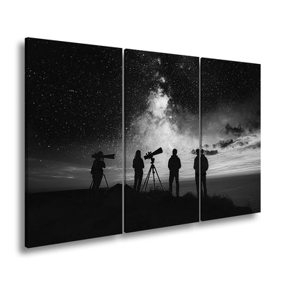 Leinwandbild Sternenhimmel und Silhouetten vereint im kosmischen Staunen - deyoli