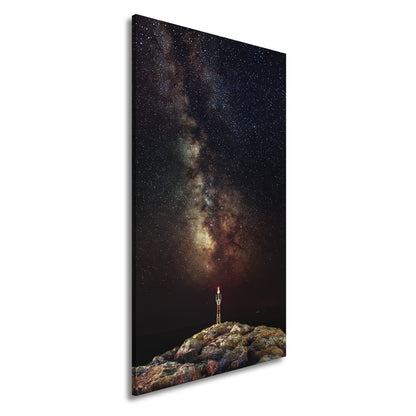 Leinwandbild Sternentor aus Licht über stiller Küste - deyoli