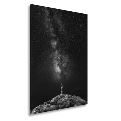 Leinwandbild Sternentor aus Licht über stiller Küste - deyoli