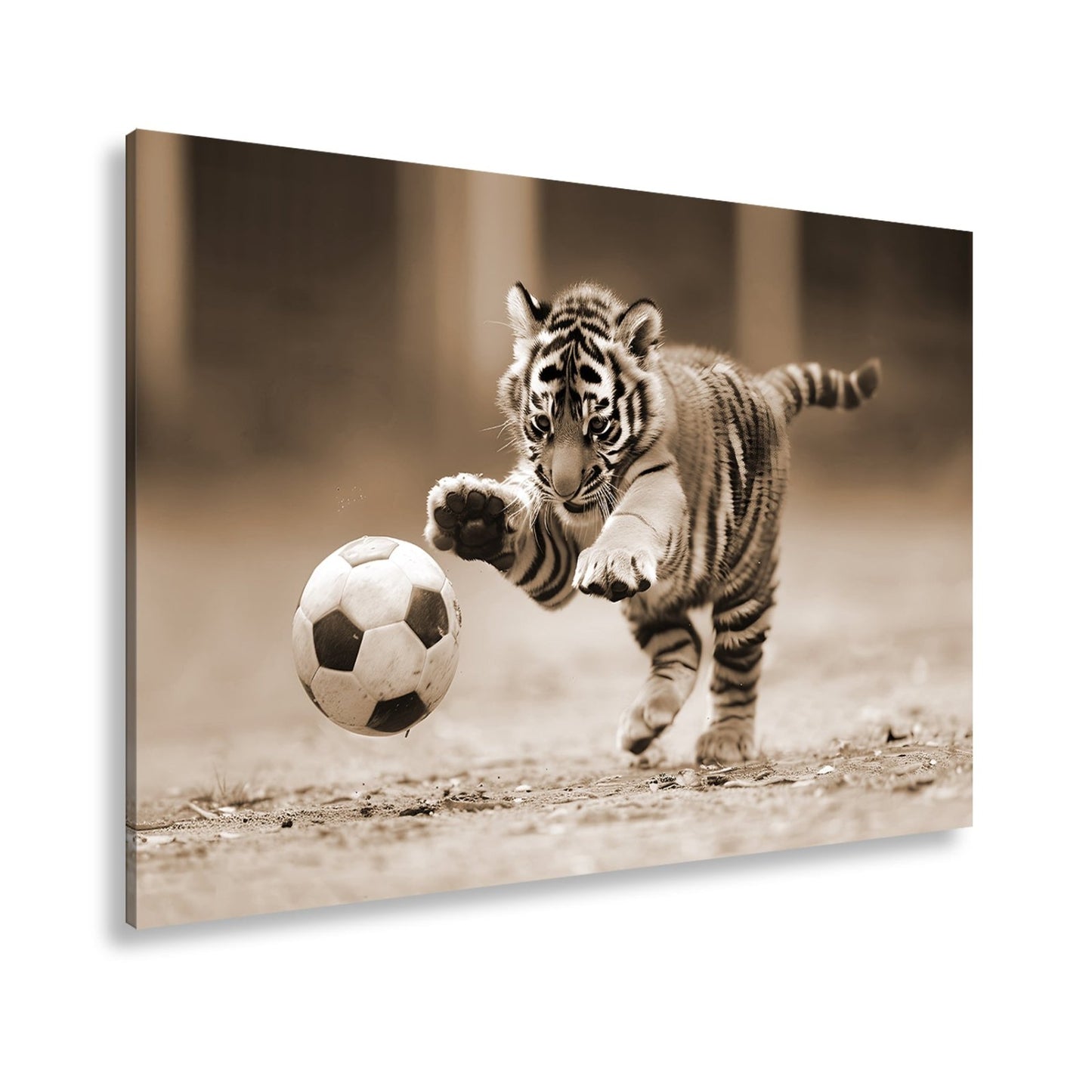 Leinwandbild Tigerbaby im Spielrausch – voller Energie am Ball. - deyoli