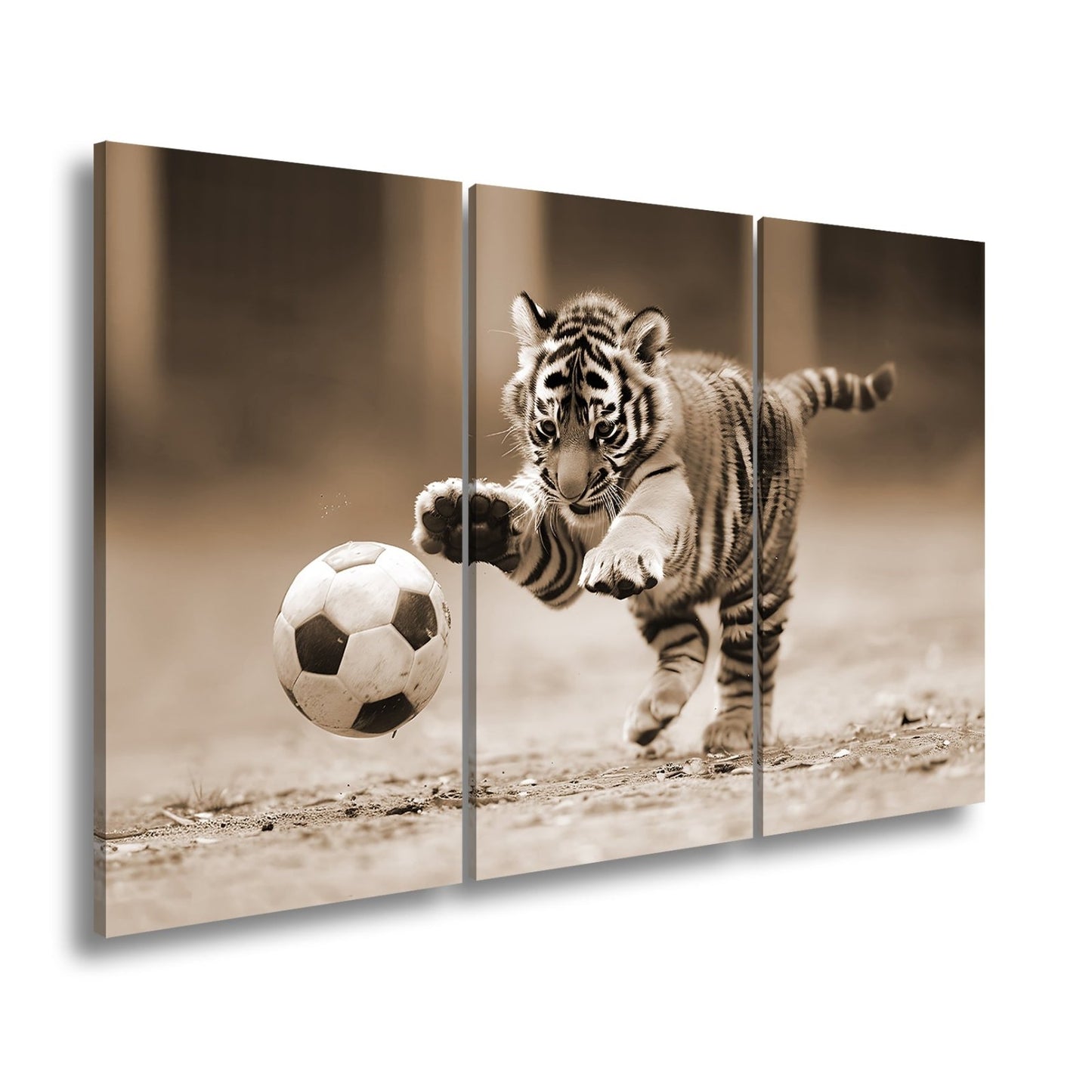Leinwandbild Tigerbaby im Spielrausch – voller Energie am Ball. - deyoli