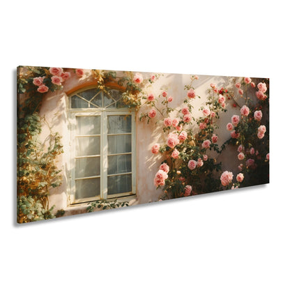 Leinwandbild Verwunschene Fassade XXL – Zarte Rosen ranken im warmen Licht - deyoli