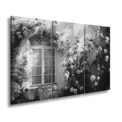 Leinwandbild Verwunschene Fassade XXL – Zarte Rosen ranken im warmen Licht - deyoli