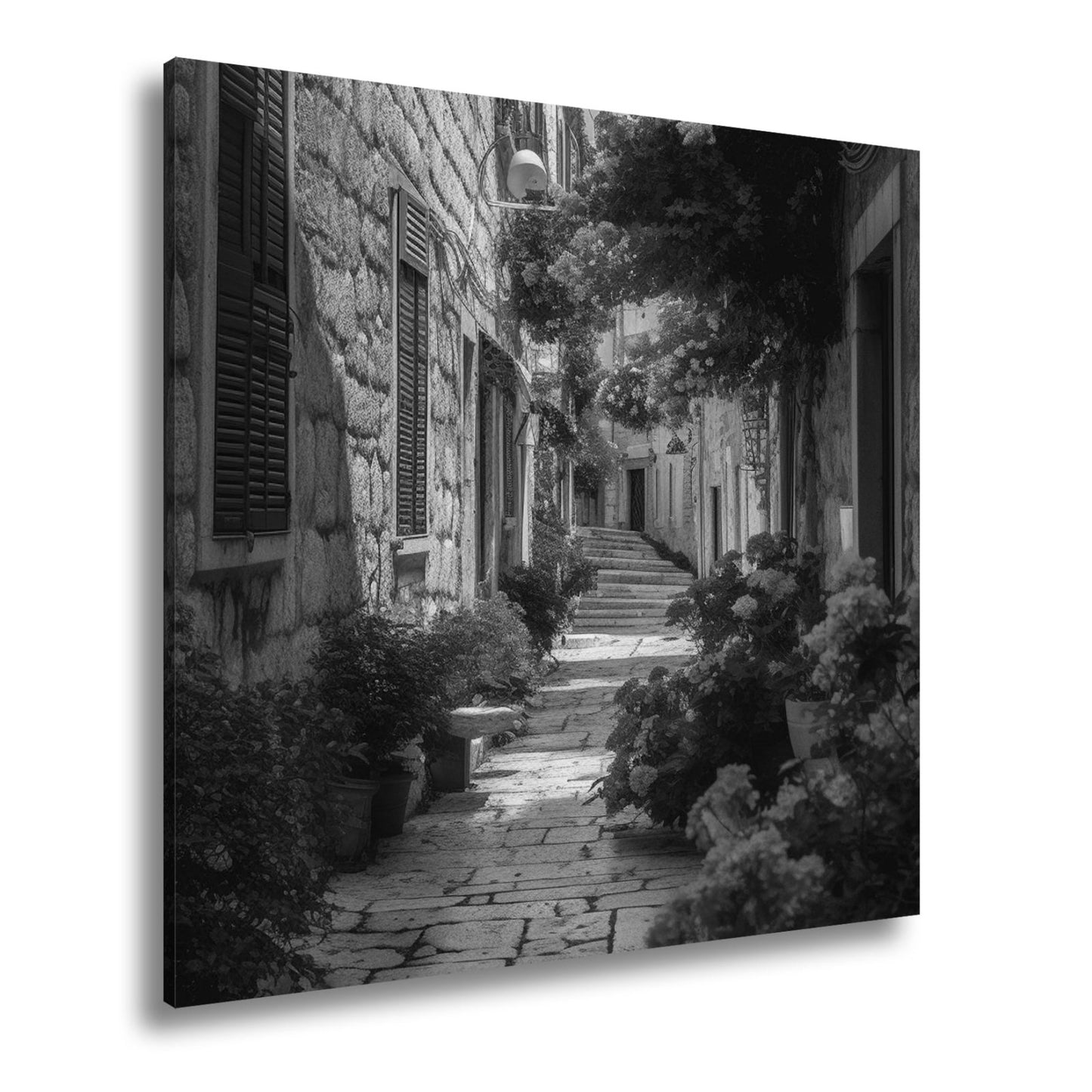 Leinwandbild Verwunschene Gasse voller Blütenpracht und mediterranem Charme - deyoli