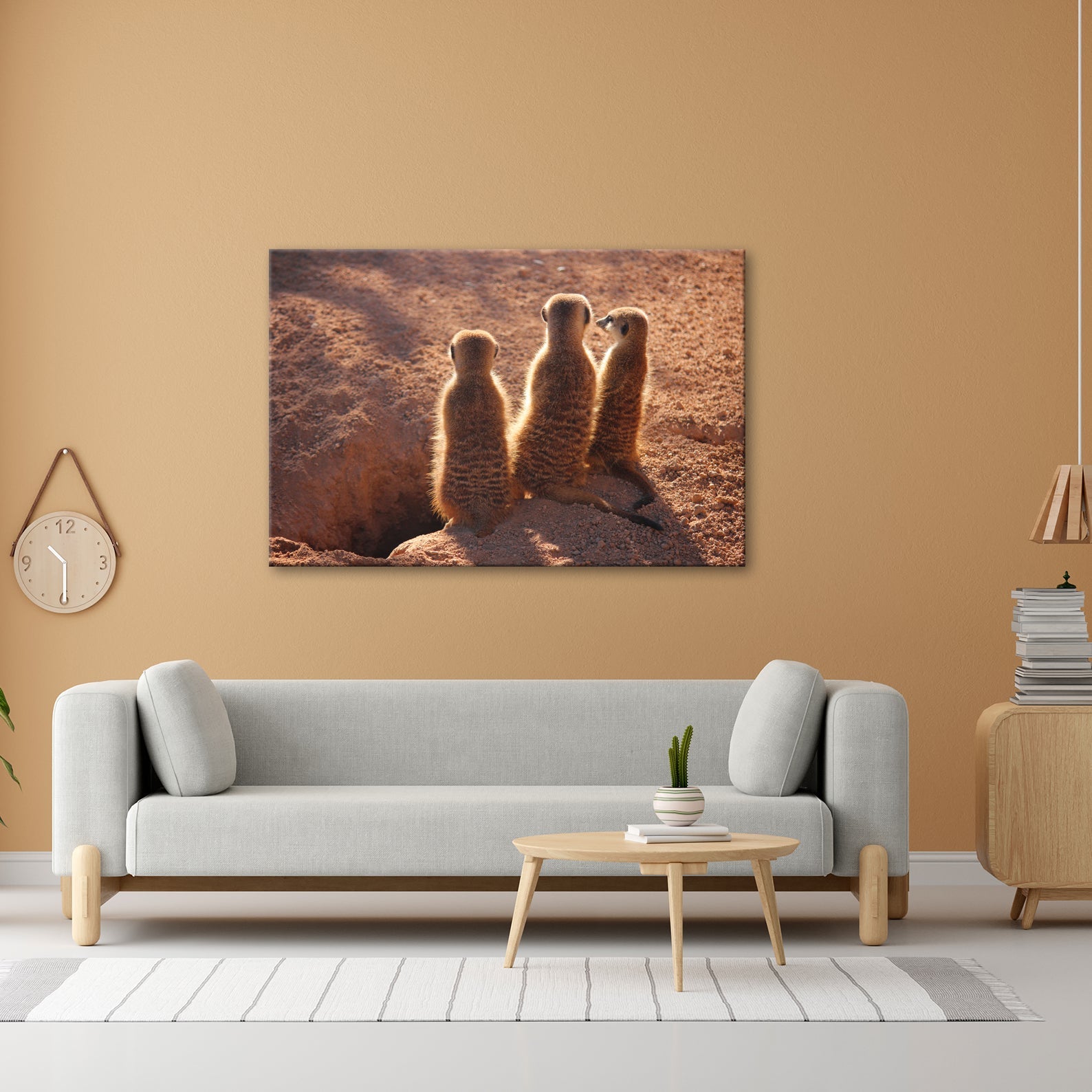 Leinwandbild Wächter im Sand – Erdmännchen im Sonnenlicht vereint. - deyoli