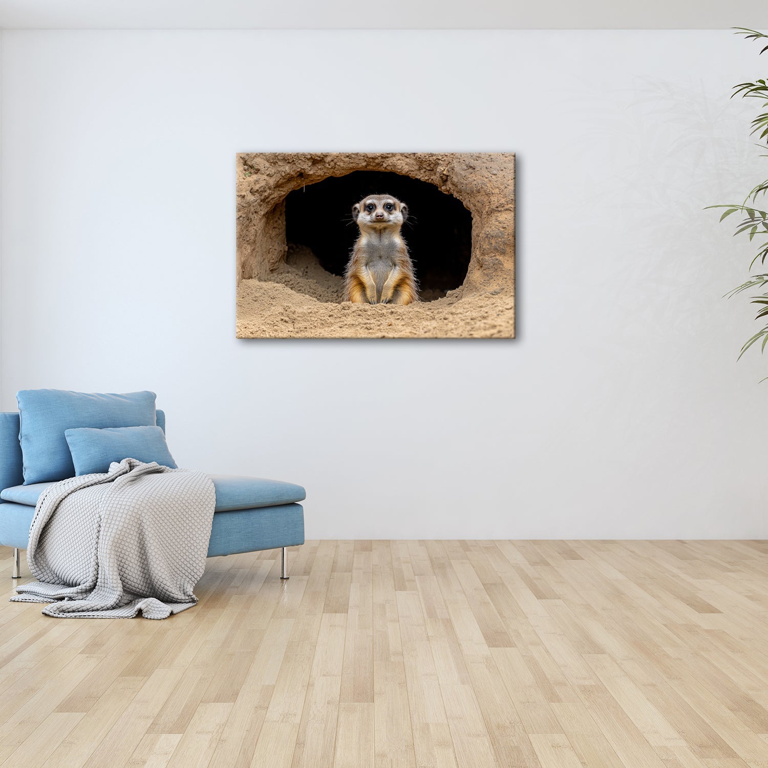 Leinwandbild Wächter der Wüste – Erdmännchen posiert vor dunklem Bau. - deyoli