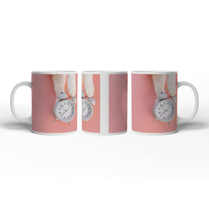 Motivtasse Flauschige Pfoten halten die Zeit auf rosa Grund. - deyoli
