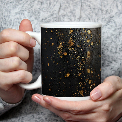 Motivtasse Goldtropfen tanzen auf samtiger Schwarznis. - deyoli