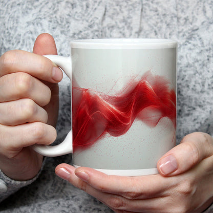 Motivtasse Zarter Schimmer aus rotem Licht, schwerelos im Raum. - deyoli