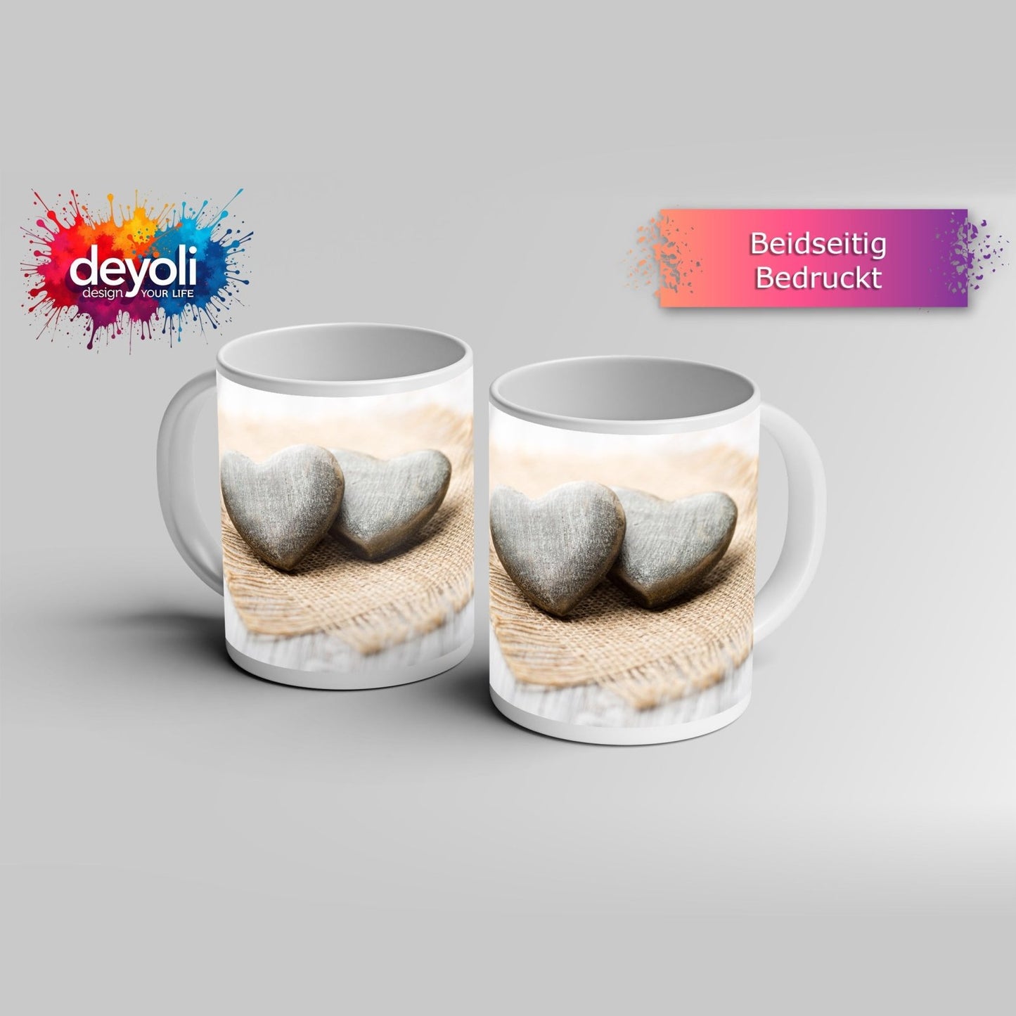 Motivtasse Zwei Steinherzen ruhen auf sanftem Leinengewebe. - deyoli